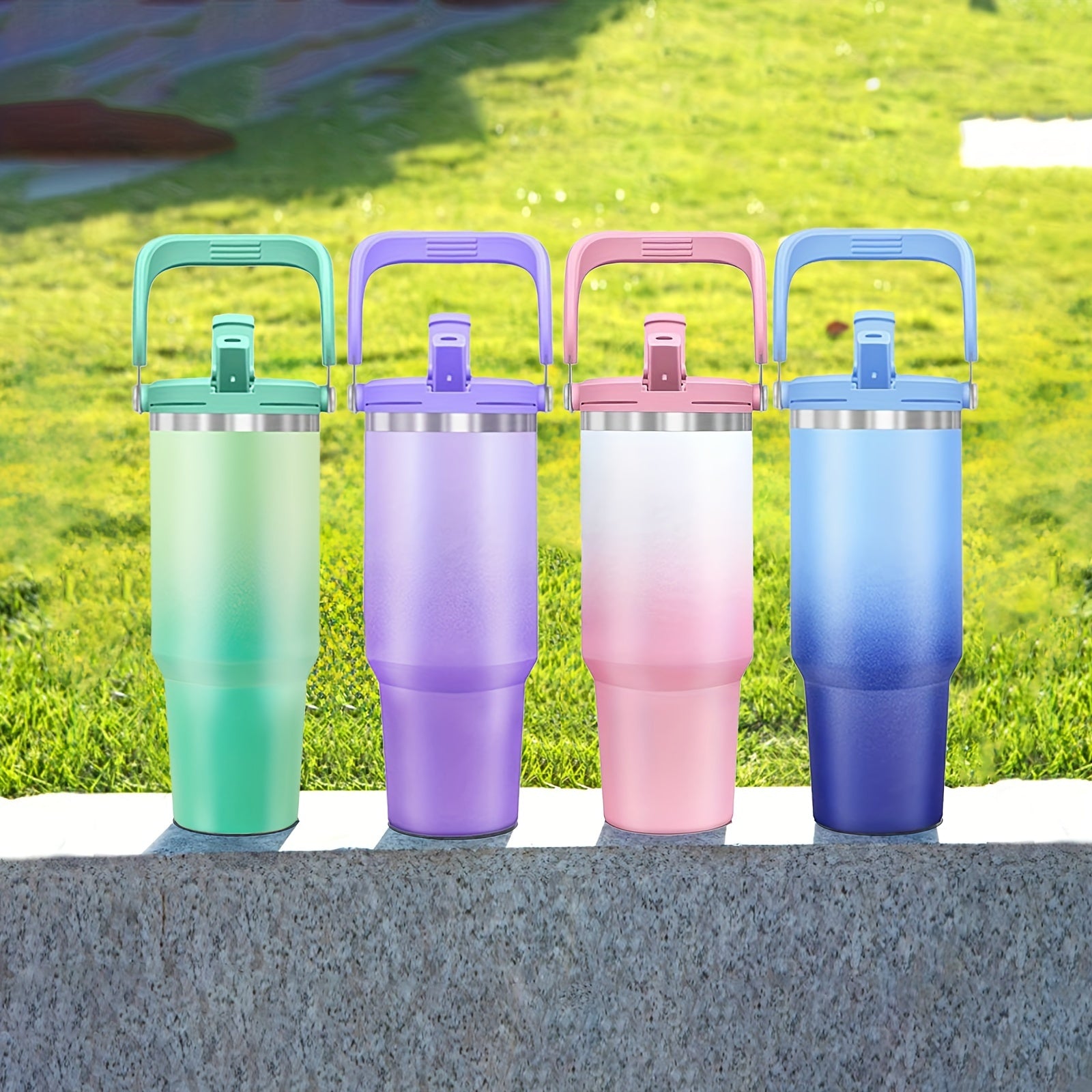 Gourde Tori 1 L en inox isotherme avec paille intégrée et poignet amovible
