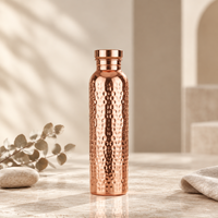 Gourde CUPA 800 ml — finition cuivrée martelée, vue de face.