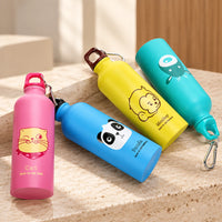 Gourde enfant inox LOUP 500 ml — assortiment de motifs animaux sur un socle en pierre.