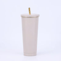 Gourde Nubo chromée tenue en main, design brillant et moderne 500 ml